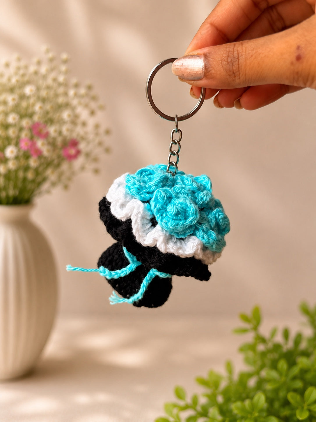 Blue handmade crochet flower bouquet keychain by Rubber Band