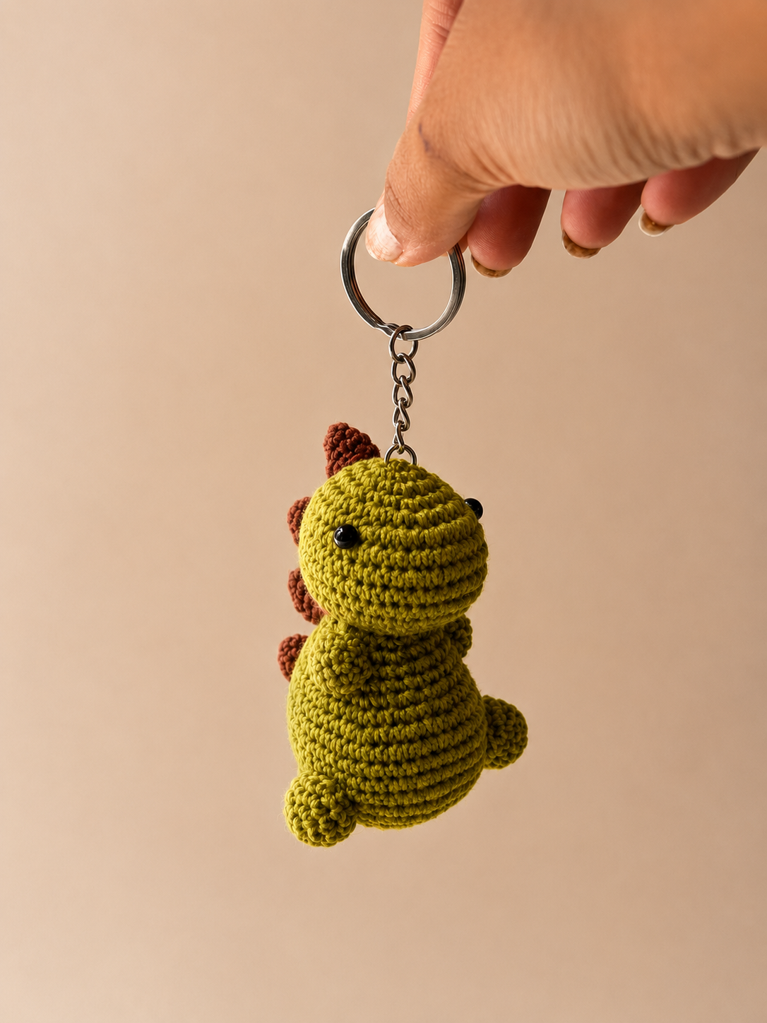 Handmade crochet dinosaur keychain