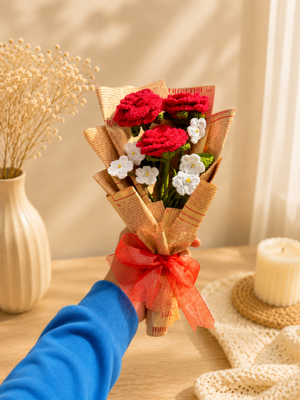 Handmade crochet red rose bouquet with white flowers wrapped with ribbon by Rubber Band