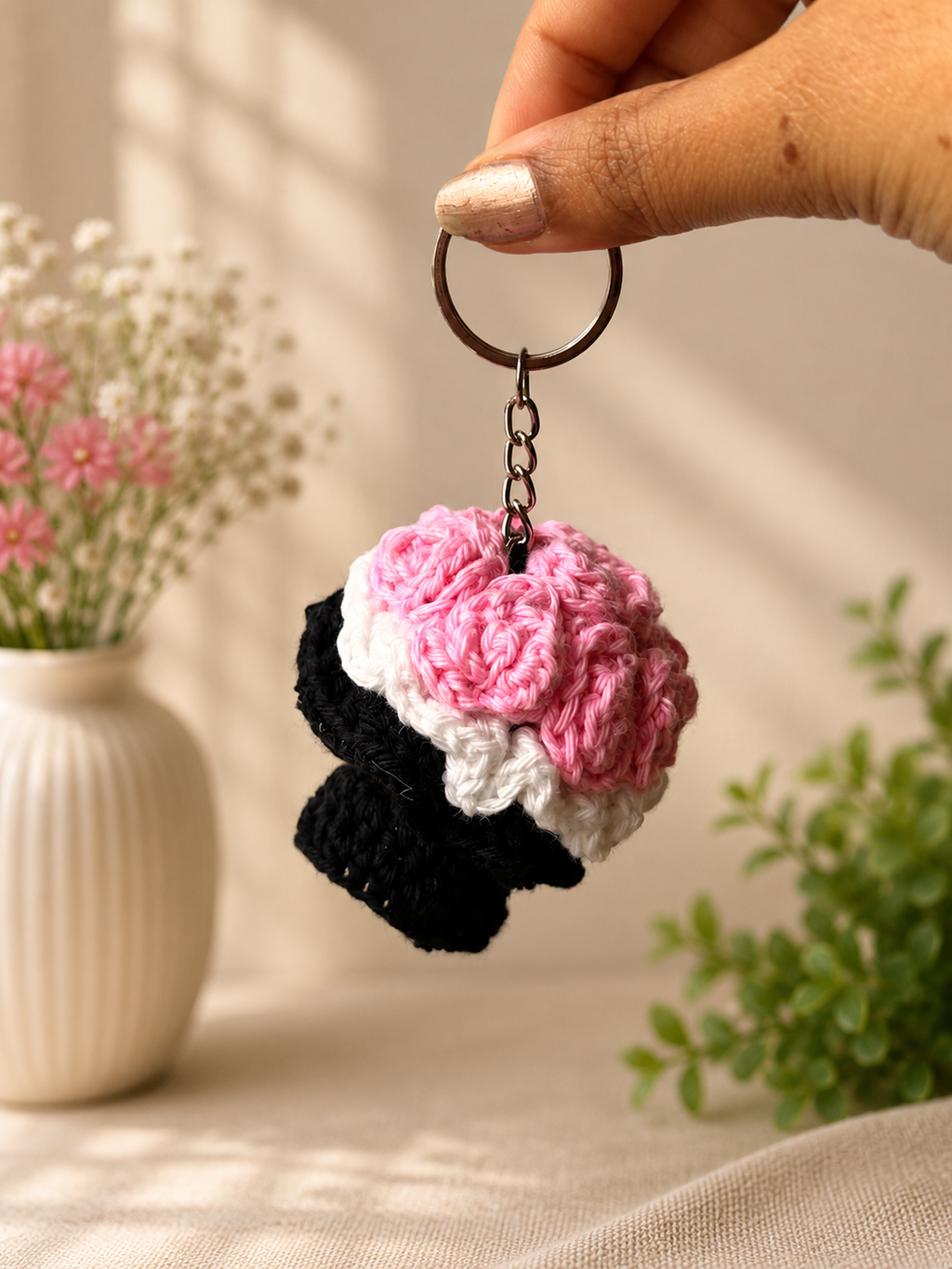 Pink crochet bouquet keychain side view