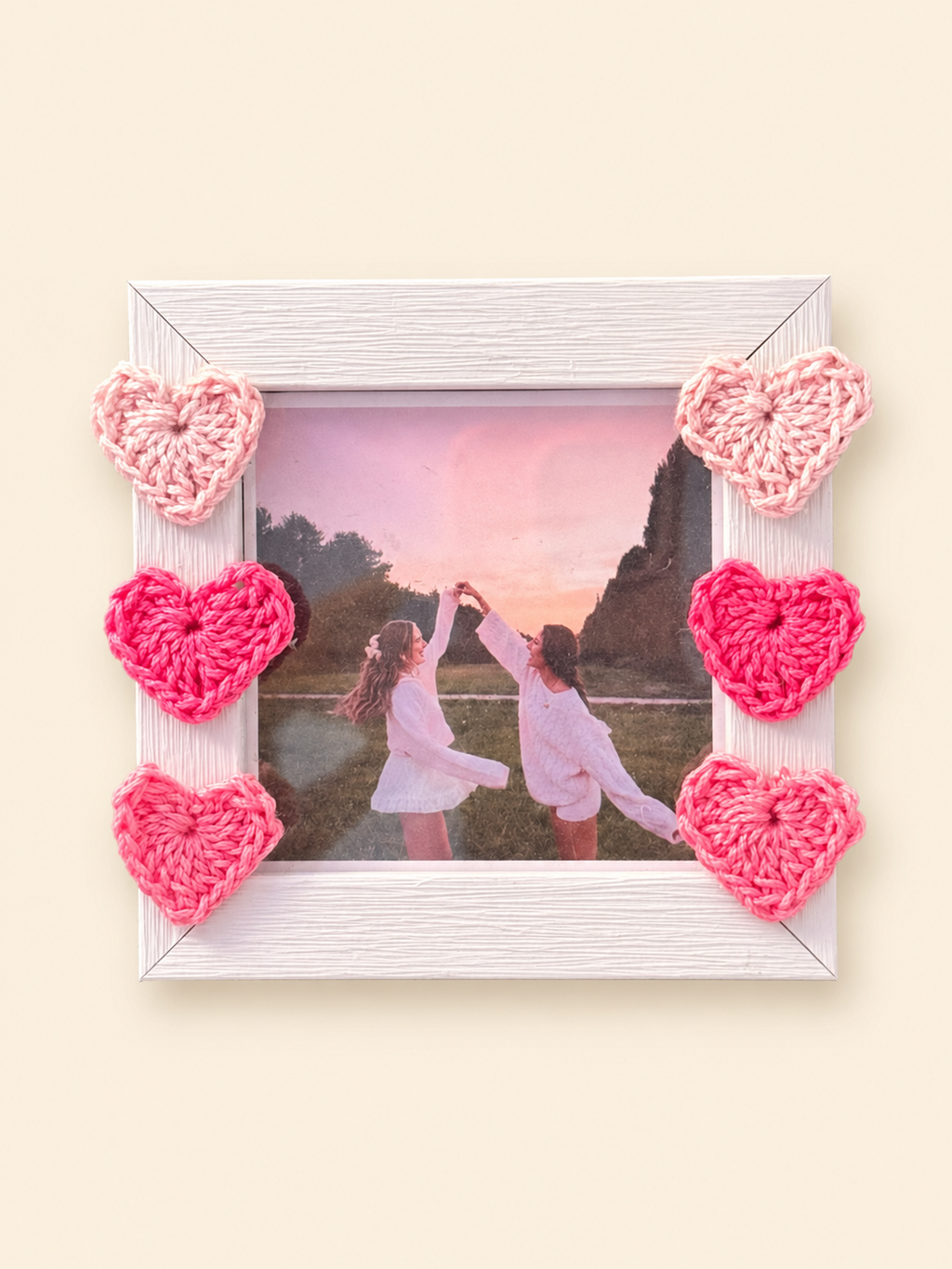 Photo frame decorated with handmade pink crochet hearts for the Rakhi gift set