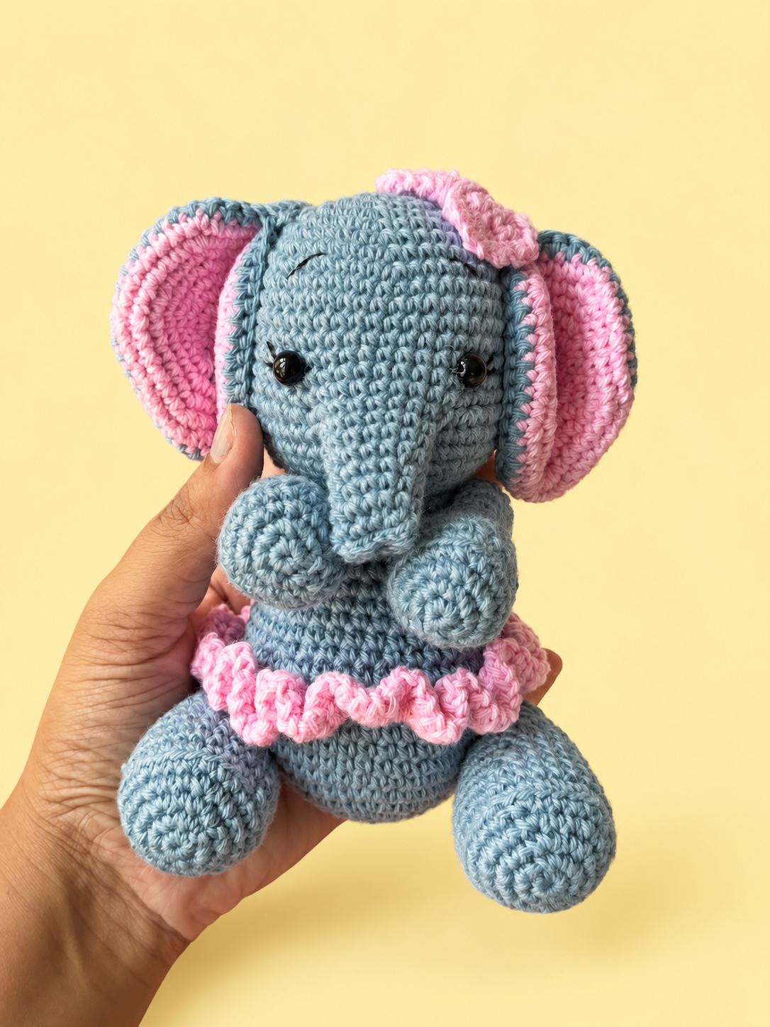 Ellie the Elephant shown in hand for scale