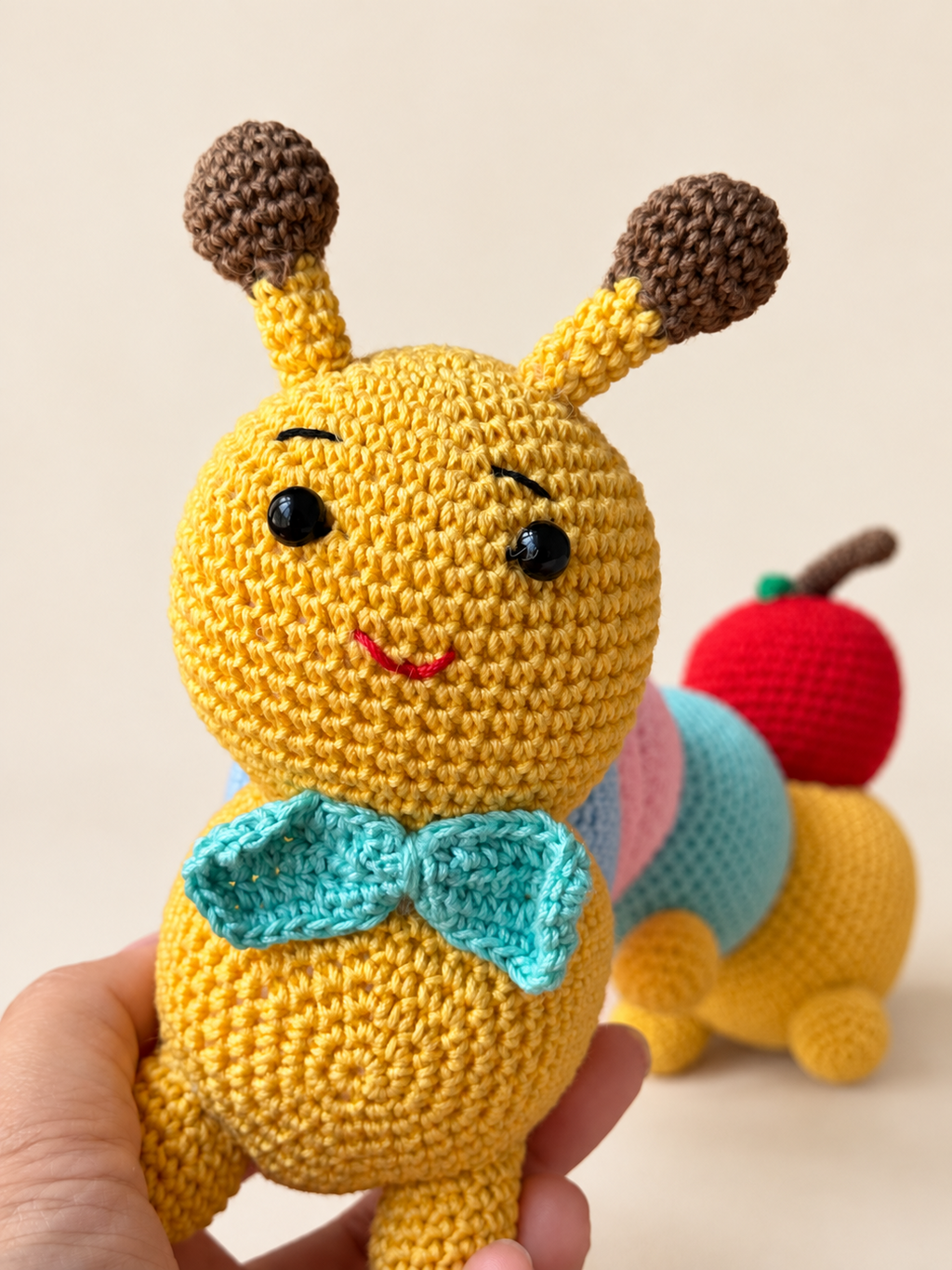 Pip the Caterpillar face and bow close view