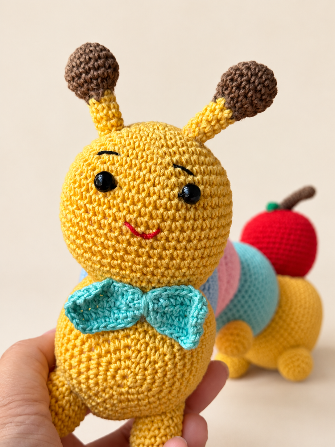 Pip the Caterpillar face and bow close view