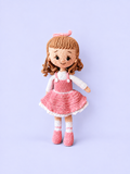 Rosie the Doll in pink dress, full front view