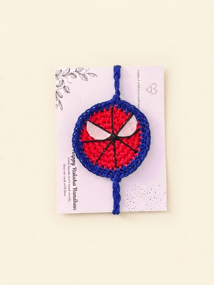 Handmade Spider-Man crochet rakhi on a Raksha Bandhan presentation card