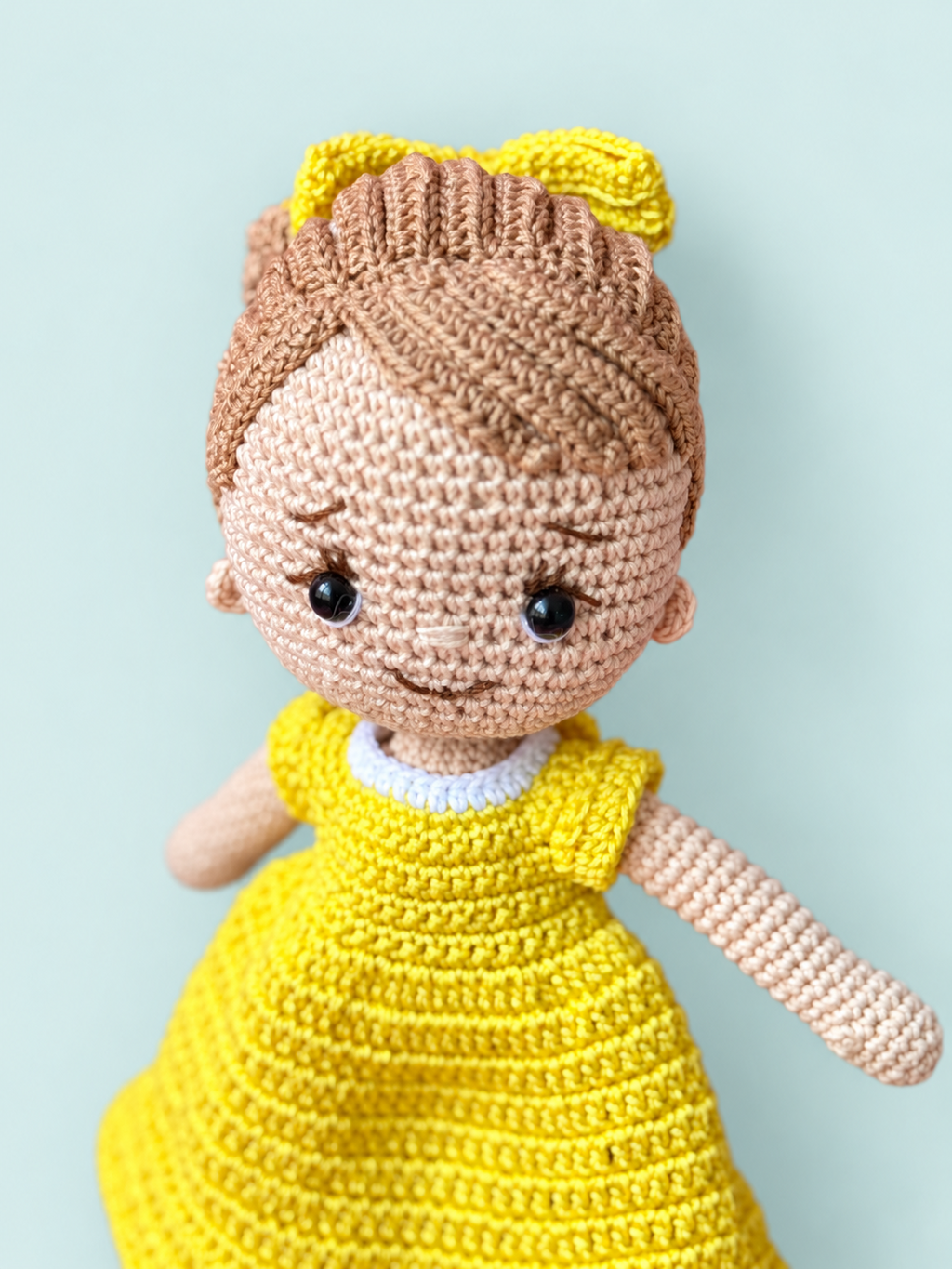 Detail of Sunny the Doll in yellow dress