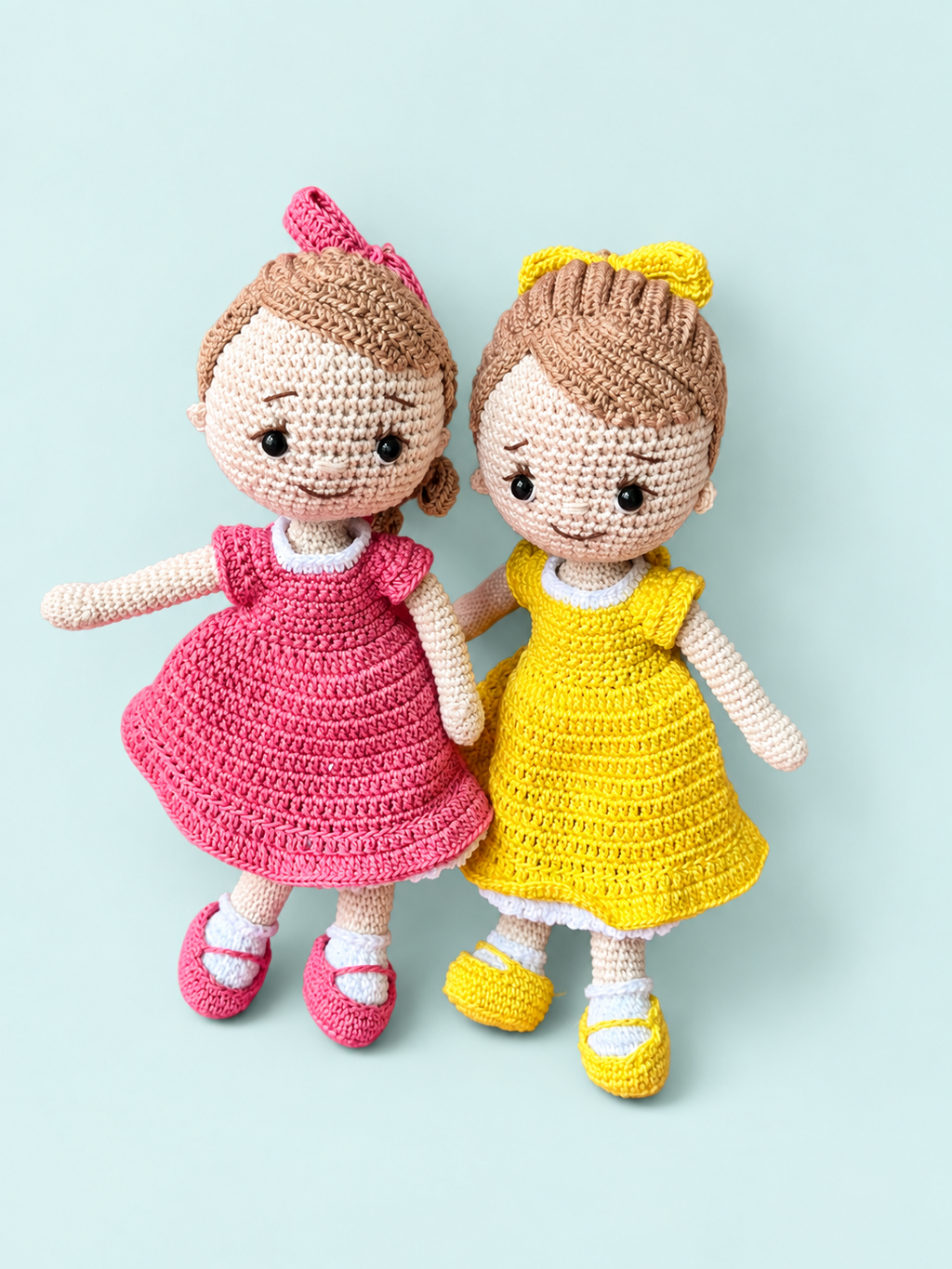Sunny the Doll in Yellow and Pink color options shown together